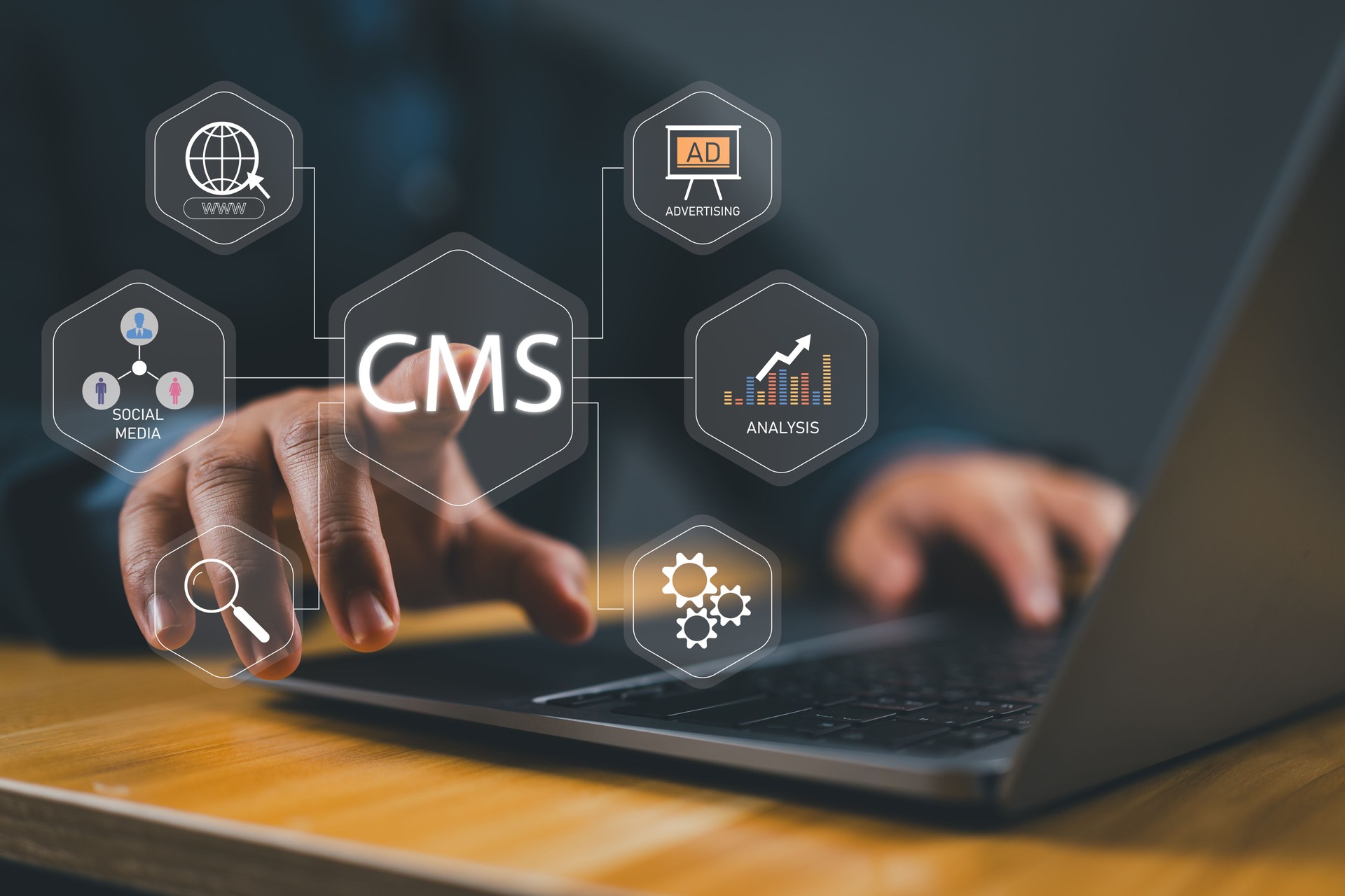 CMS, Content management system concept. Person using laptop with virtual screen for content management system icon for business website management.